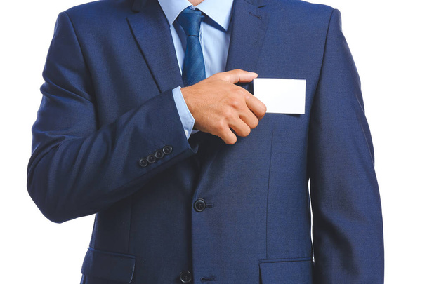 Elegant man in suit with blank badge on white background - Foto, afbeelding