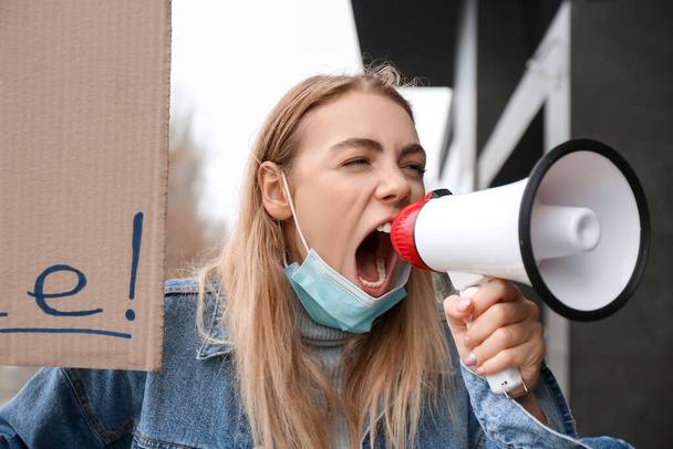 Protesting young woman outdoors. Impeachment concept - Photo, Image