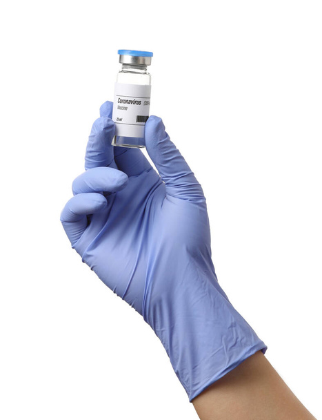 Рука врача с вакциной для иммунизации против COVID-19 на белом фоне - Фото, изображение