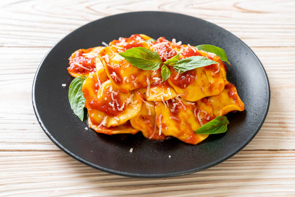 Ravioli with tomato sauce and basil - Italian food style - Fotoğraf, Görsel