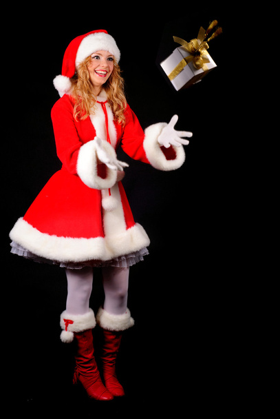 Christmas santa girl on black - Foto, Imagen