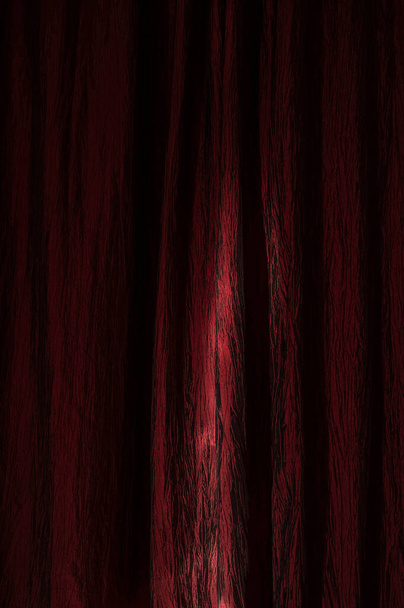 Red stage curtain background black reflections on the drapery. Gothic decoration, for a background or poster, for theater or cinema - Foto, Bild