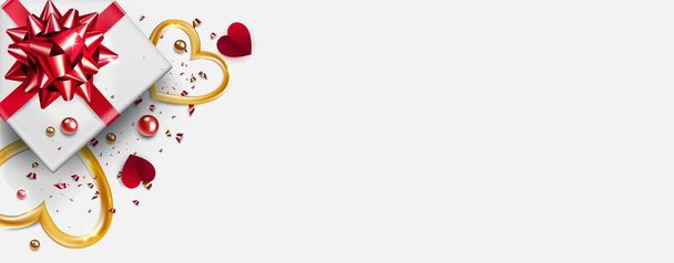 horizontális háttér a Valentin-napi gratulációhoz. Üdvözlőlap ajándékkal és piros szalaggal, arany szívvel és fényes cukorkával, fehér alapon szétszórva.Boldog Valentin-napi promóciós banner - Vektor, kép