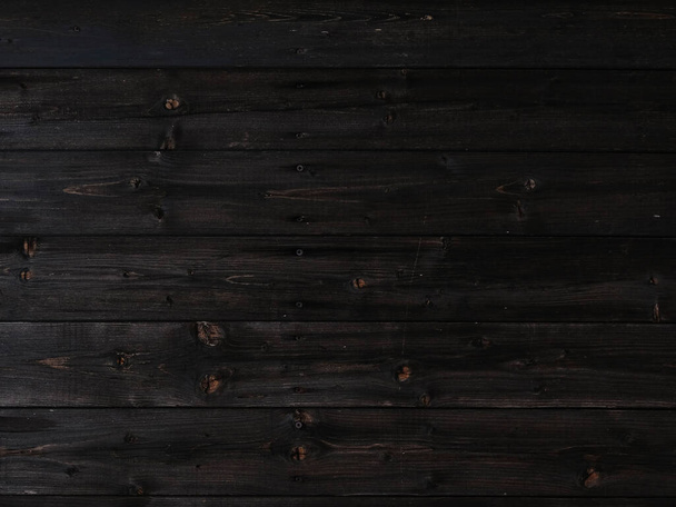 Natural Dark Wooden Background. Wooden rustic background. Old boards. Copy space for your text or image. Top view. Dark brown wood boards.  Blank for design and require a wood grain. - Photo, Image