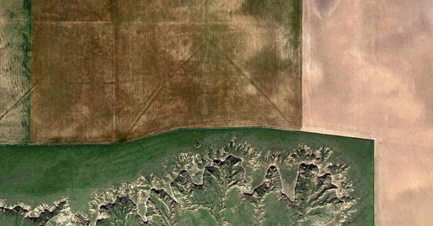    United States, abstract photography of relief drawings in  fields in the U.S.A. from the air, Genre: Abstract Naturalism, from the abstract to the figurative,   - Photo, Image