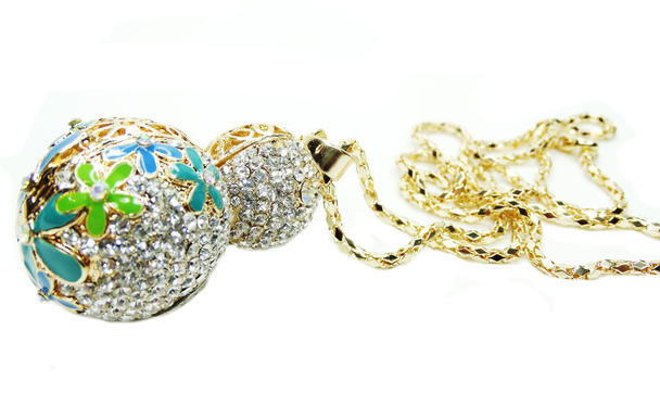 κρεμαστό κόσμημα κοσμήματα σε χρυσό με διαμάντι φωτεινά κρύσταλλα - Φωτογραφία, εικόνα