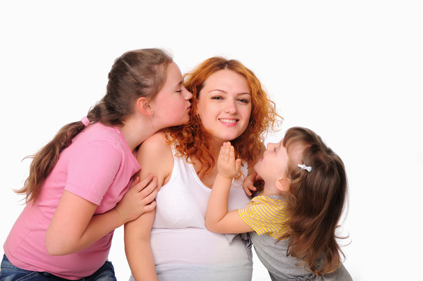 Young pregnant mother and her two daughters - Foto, immagini
