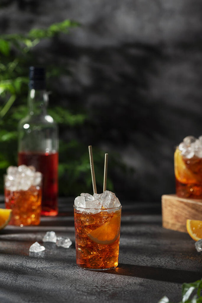 Bar conceprt. Summer Italian cocktail aperol with ice and orange, selective focus image - Valokuva, kuva