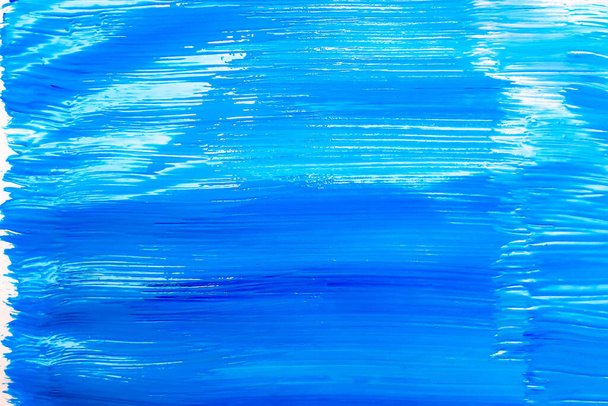 Blue background from brush strokes with acrylic paint. - 写真・画像