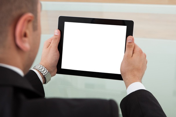 Businessman Using Digital Tablet In Office - Foto, Imagem