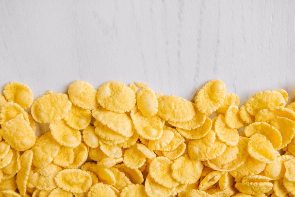 Cornflakes on white background. Top view. Place for your text. - Fotografie, Obrázek