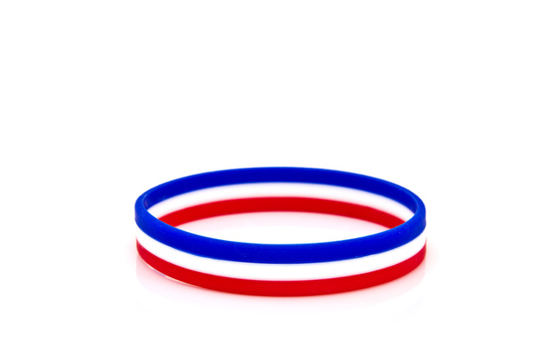 rubber plastic stretch thai flag bracelet isolated on white back - Photo, Image
