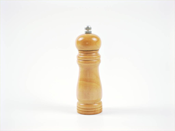 Wood pepper grinder isolated on white background - Photo, Image