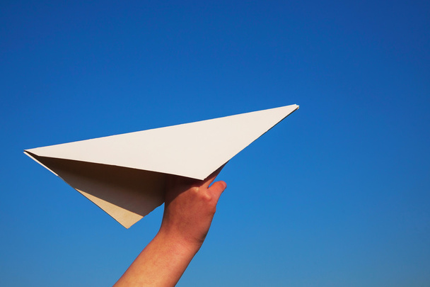 Hand holding paper plane - Foto, Bild
