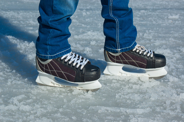 Feet in ice skating rink - Fotoğraf, Görsel
