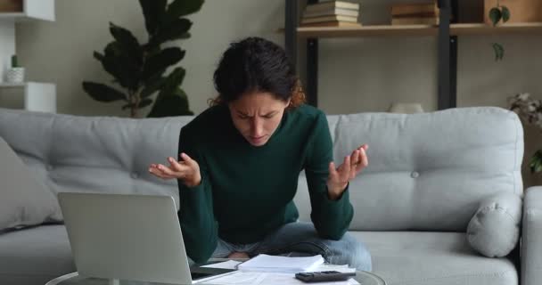 Woman calculates personal finances feels upset about financial problems - Materiaali, video