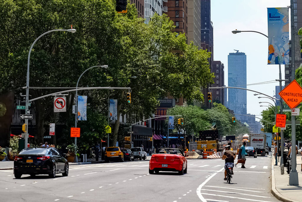 New York City Manhattan street panorama with yellow New York City taxi cabs on the streets. Manhattan, New York. - Фото, зображення