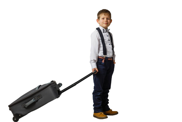  Little boy with suitcase isolated on white - Fotoğraf, Görsel