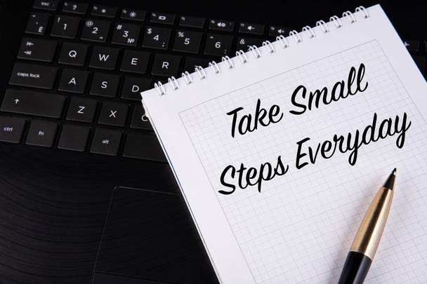 Take Small Steps Everyday - written on a notebook with a pen. High quality photo - Фото, зображення