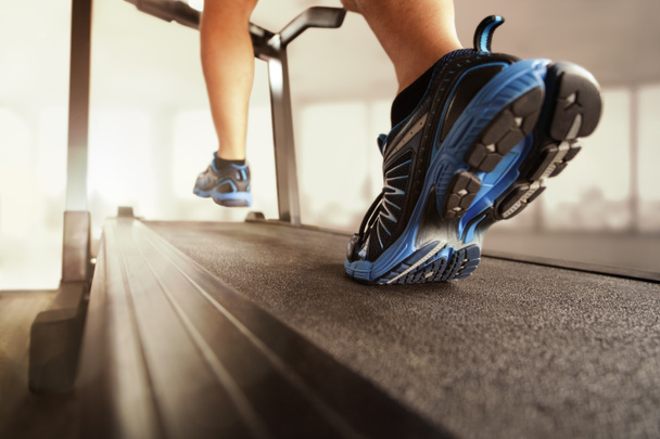 Man running on treadmill - Photo, Image