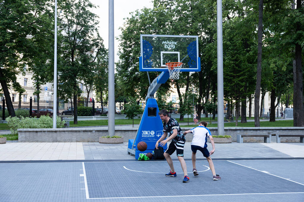 Outdoor basketball court in the city. Street basketball concept. - Fotoğraf, Görsel