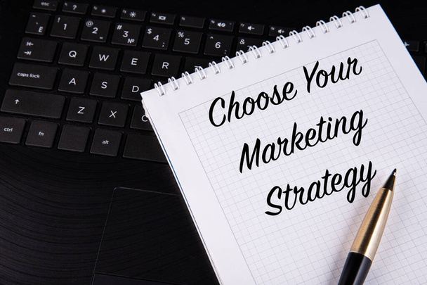 Choose Your Marketing Strategy - written on a notebook with a pen. High quality photo - Фото, зображення
