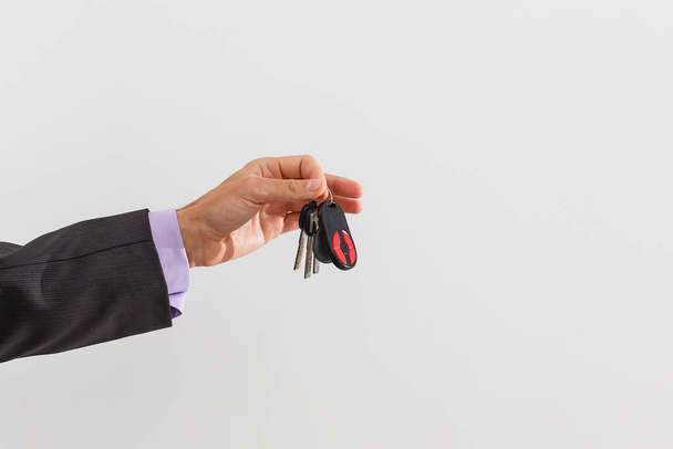 businessman holding a car key - Photo, Image