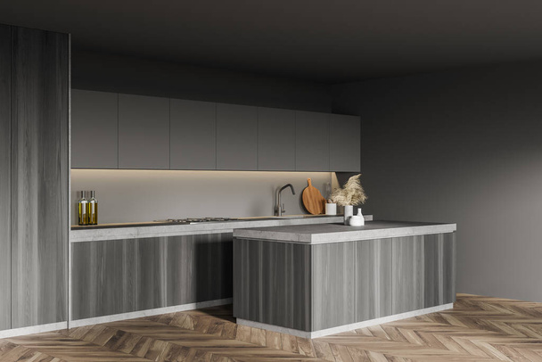 Corner of modern kitchen with gray walls, wooden floor, wooden cupboard and island. 3d rendering - 写真・画像