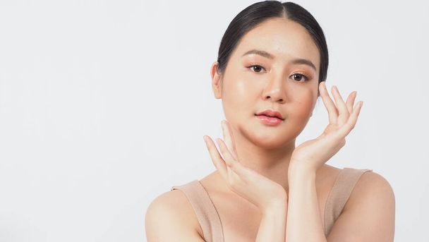 Beauty and skin concept. Young asian woman beauty face make up for skincare cosmetic and showing natural wellness soft and firm and ageless facial skin. she younger-looking or youthful. real acne no retouch. - Photo, Image
