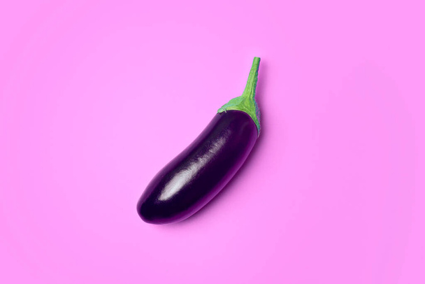 Eggplant vegetable on a pink minimal background. Vegetables and food minimal concept. - Foto, Imagem
