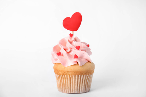 Tasty cupcake for Valentine's Day on white background - Fotó, kép