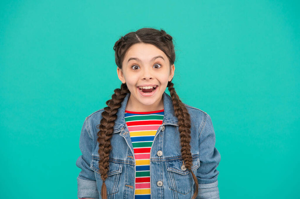 Lets create your perfect smile. Happy kid wear plait hair in braids blue background. Dental hygiene. Oral care products. Filling teeth. Dental health service. Pediatric dentistry. Always smiling - Foto, Imagem