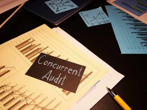 Concurrent audit is shown on the conceptual photo using the text - Photo, Image
