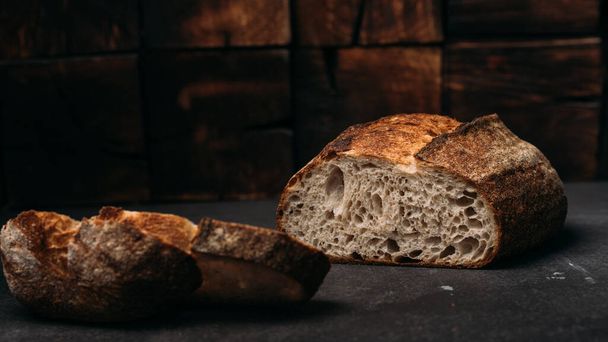 Beautiful rustic artisan bread cut - Фото, изображение