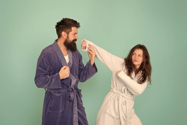 Defend yourself. Sexy girl pick fight with hipster. Challenging relations. Couple in love blue background. Family relations. Relations and bonds. Family values. Relations and relationship - Foto, Bild
