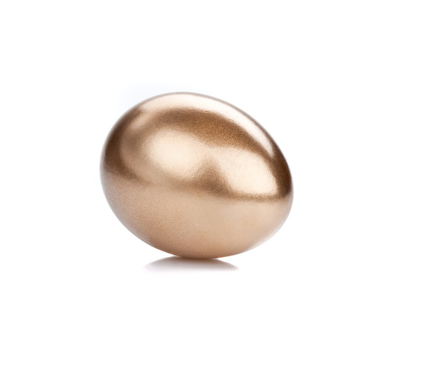 Golden egg isolated on the white background - Фото, изображение