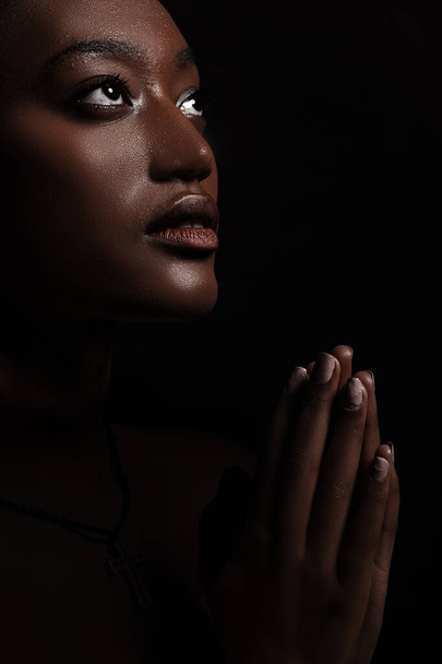 Praying african woman - Фото, изображение