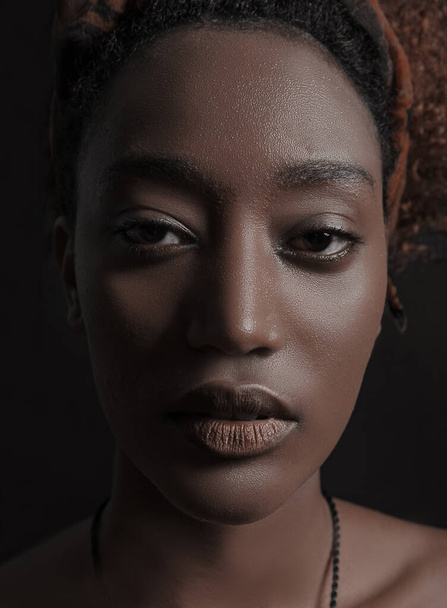 Beautiful face of african woman - Фото, изображение