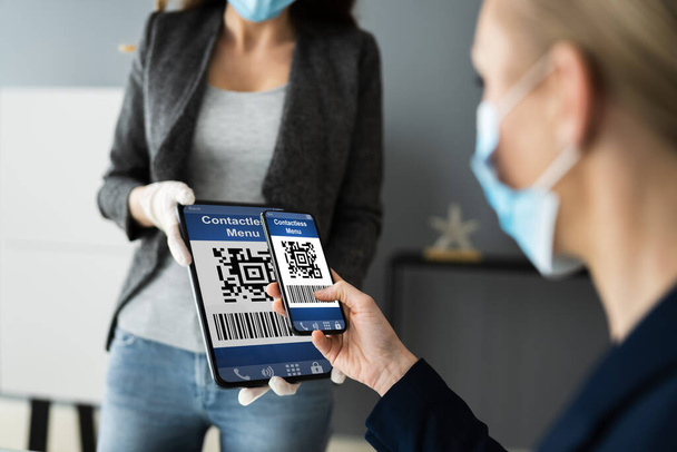 Customer Scanning Online Menu Code With Smartphone Wearing Face Mask - Фото, изображение