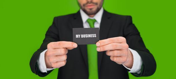 handsome businessman showing blank business card - Фото, изображение