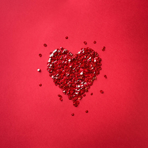 Red Heart on red background, romantic love and Valentine's Day concept, flat lay. - Photo, image