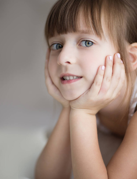 Closeup portrait of cute little girl indoors - Foto, imagen