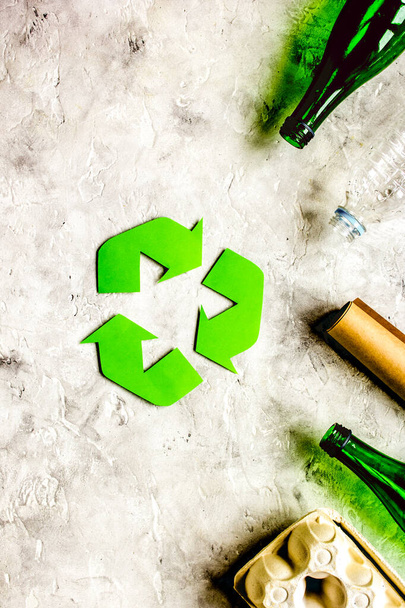 environment concept with recycling symbol on stone background top view mock-up - Photo, Image