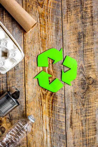 Eco concept with recycling symbol on table background top view mockup - Foto, afbeelding