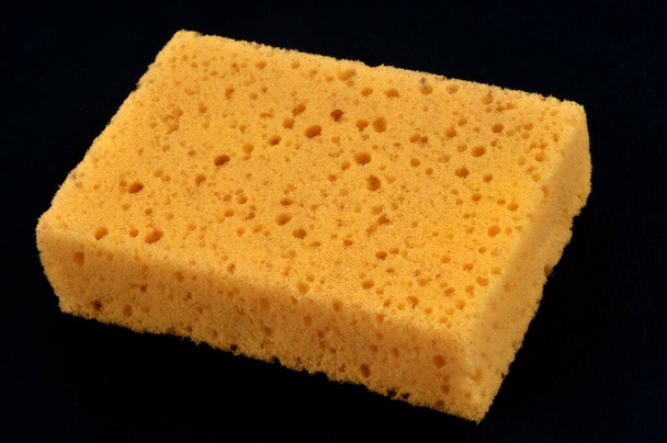 Sponge close-up on black background - Photo, Image