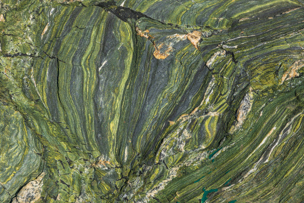 Бірюзова зелена скеля, фонова текстура, природний камінь біля узбережжя острова Фолегандрос. Греція. - Фото, зображення