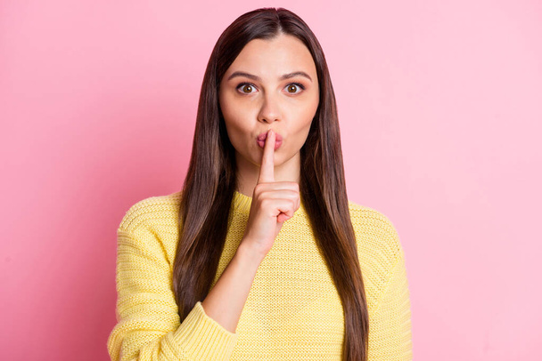 Photo of shiny young lady wear casual yellow outfit finger mouth asking not tell secrets isolated pastel pink color background - Photo, Image