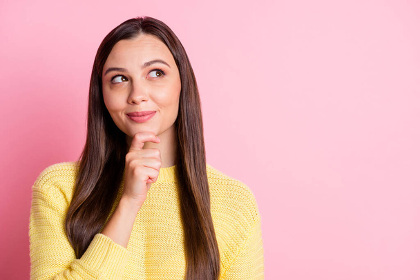 Portrait of young attractive dreamy cute positive woman look copyspace hold hand on chin isolated on pink color background - Fotografie, Obrázek