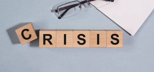 Business crisis. Inscription about financial problem and economical decline. - Фото, изображение