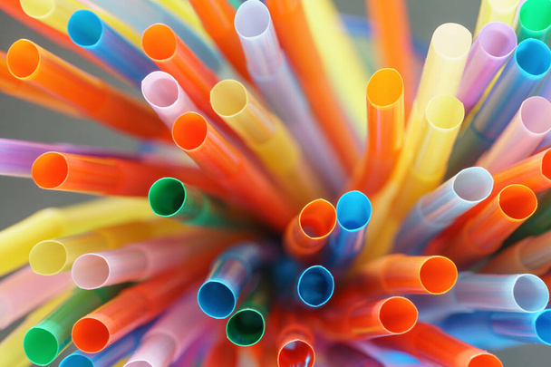 Close up of colorful straws photographed from above, studio shot - Photo, Image
